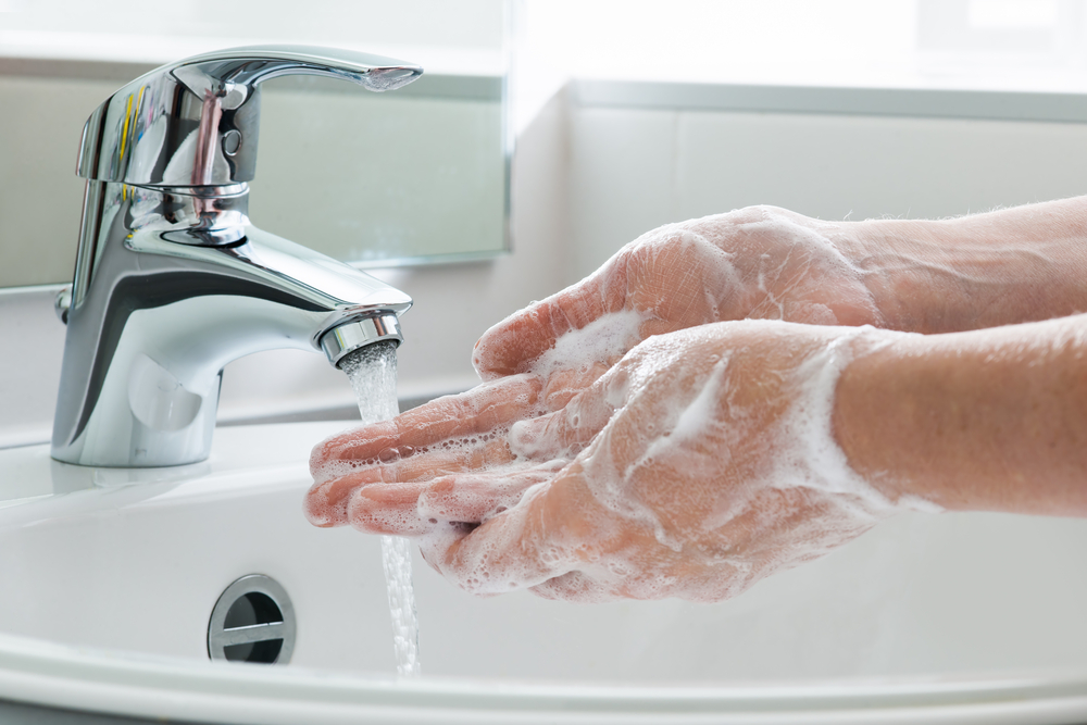 washing hands with soap and water